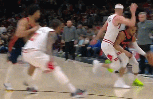 A Basketball Player Wearing A Jersey That Says ' Nuggets ' On It GIF