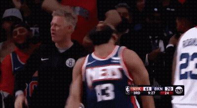 A Basketball Player Wearing A Jersey That Says Nyk On It GIF