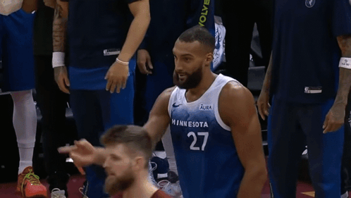 A Basketball Player Wearing A Jersey That Says Ota On It GIF