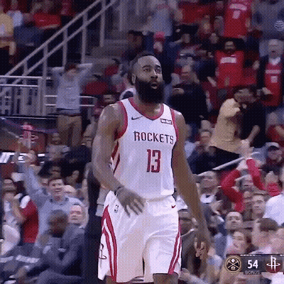 A Basketball Player Wearing A Jersey That Says Rockets Is Standing In Front Of A Crowd . GIF