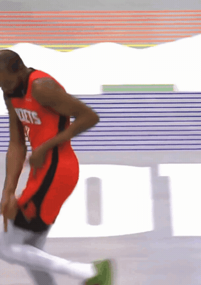 A Basketball Player Wearing A Jersey That Says Rockets On It GIF