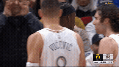 A Basketball Player Wearing A Jersey That Says Vicevic GIF