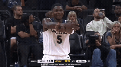 A Basketball Player Wearing A Jersey That Says Wolves 5 GIF