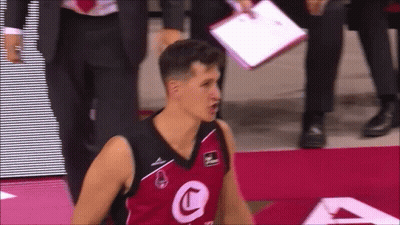 A Basketball Player Wearing A Jersey With A Letter C On It GIF