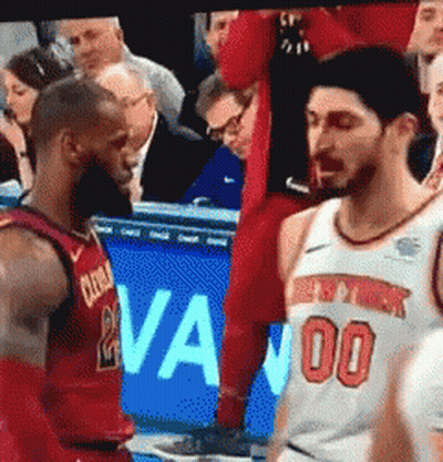 A Basketball Player Wearing A Jersey With The Number 100 On It GIF