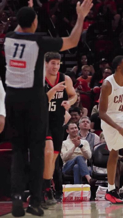 A Basketball Player Wearing A Jersey With The Number 15 On It GIF