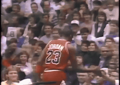 A Basketball Player Wearing A Jersey With The Number 23 On It GIF