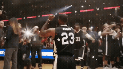 A Basketball Player Wearing A Jersey With The Number 23 On The Back GIF