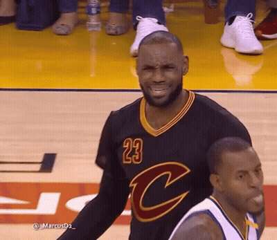 A Basketball Player Wearing A Jersey With The Number 23 GIF