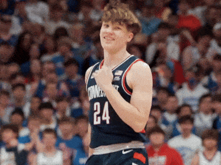A Basketball Player Wearing A Jersey With The Number 24 GIF