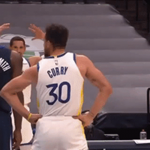 A Basketball Player Wearing A Jersey With The Number 30 GIF