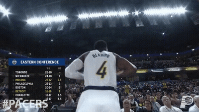 A Basketball Player Wearing A Jersey With The Number 4 On It GIF