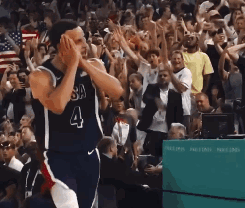 A Basketball Player Wearing A Jersey With The Number 4 GIF