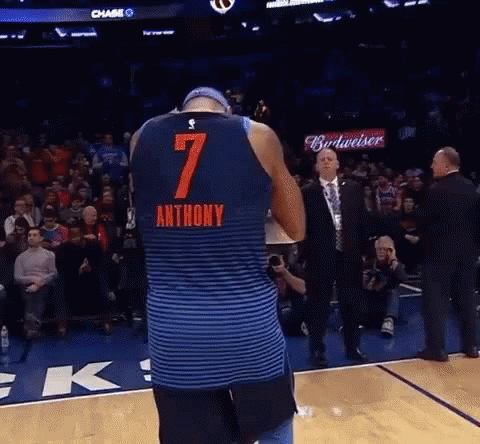 A Basketball Player Wearing A Jersey With The Number 7 On The Back GIF
