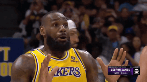A Basketball Player Wearing A Lakers Jersey Is Making A Funny Face GIF