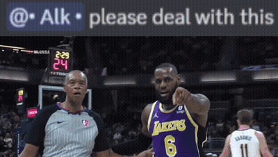 A Basketball Player Wearing A Lakers Jersey Is Pointing At The Camera GIF