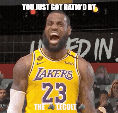 A Basketball Player Wearing A Lakers Jersey Is Screaming With His Mouth Open GIF