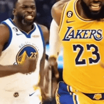A Basketball Player Wearing A Lakers Jersey Is Standing Next To Another Basketball Player Wearing A Golden State Warrior GIF