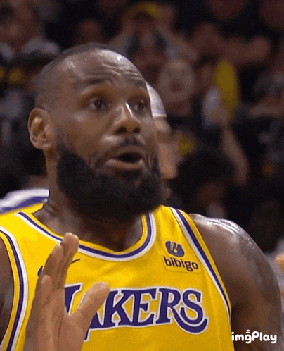 A Basketball Player Wearing A Lakers Jersey Makes A Funny Face GIF