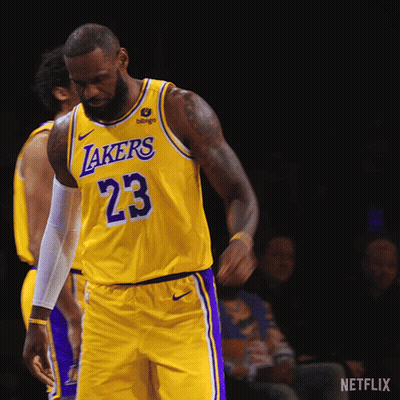 A Basketball Player Wearing A Lakers Jersey Number 23 GIF