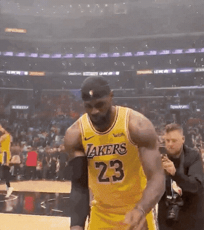 A Basketball Player Wearing A Lakers Jersey Number 23 GIF