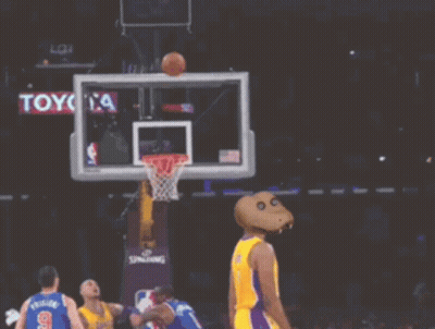 A Basketball Player Wearing A Lakers Jersey Throws A Basketball Through A Hoop GIF