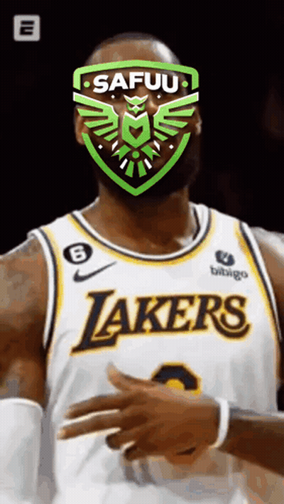 A Basketball Player Wearing A Lakers Jersey With A Green Emblem On His Face . GIF