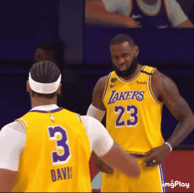 A Basketball Player Wearing A Lakers Jersey With The Number 23 On It GIF