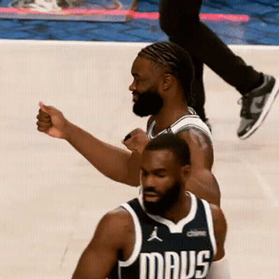 A Basketball Player Wearing A Mavs Jersey Giving A Thumbs Up GIF
