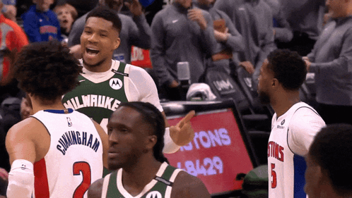A Basketball Player Wearing A Milwaukee Jersey GIF