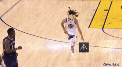 A Basketball Player Wearing A Monkey Head And Holding A Sign That Says Aapes GIF
