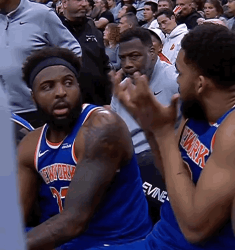 A Basketball Player Wearing A New York Jersey GIF