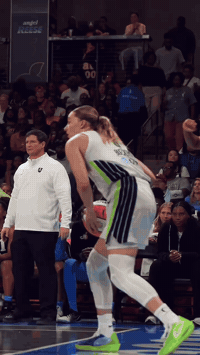 A Basketball Player Wearing A Number 00 Jersey Stands On The Court GIF