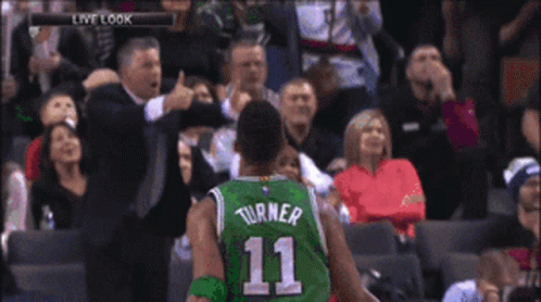 A Basketball Player Wearing A Number 11 Jersey GIF