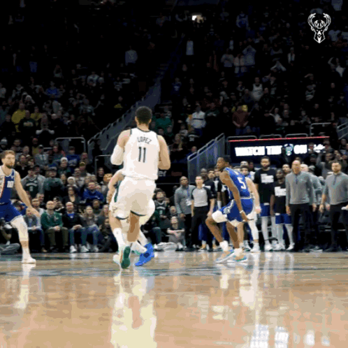 A Basketball Player Wearing A Number 11 Jersey GIF
