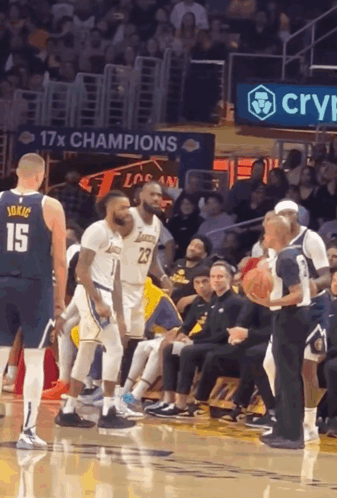 A Basketball Player Wearing A Number 15 Jersey Stands On The Court GIF