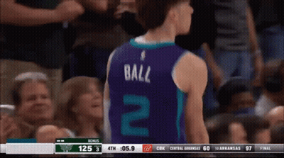 A Basketball Player Wearing A Number 2 Jersey Stands In Front Of A Crowd GIF