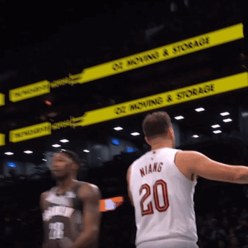 A Basketball Player Wearing A Number 20 Jersey GIF
