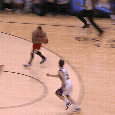 A Basketball Player Wearing A Number 23 Jersey GIF