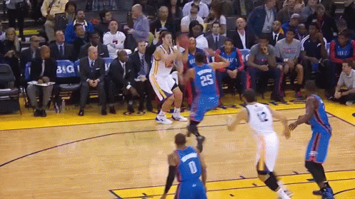 A Basketball Player Wearing A Number 25 Jersey Tries To Get A Rebound GIF
