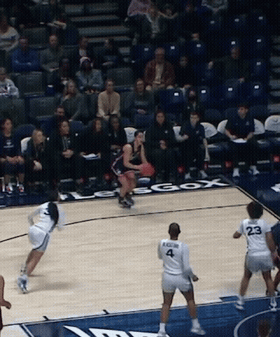 A Basketball Player Wearing A Number 4 Jersey GIF