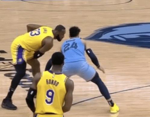 A Basketball Player Wearing A Number 9 Jersey Stands On The Court GIF