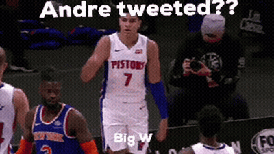 A Basketball Player Wearing A Pistons Jersey Is Standing On The Court GIF