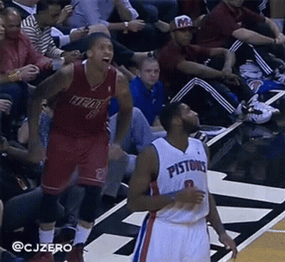 A Basketball Player Wearing A Pistons Jersey Is Standing On The Court GIF