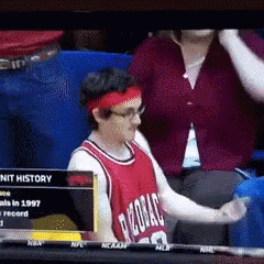 A Basketball Player Wearing A Red Jersey That Says ' Chicago ' On It GIF