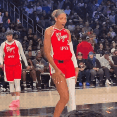 A Basketball Player Wearing A Red Jersey That Says Las Vegas GIF