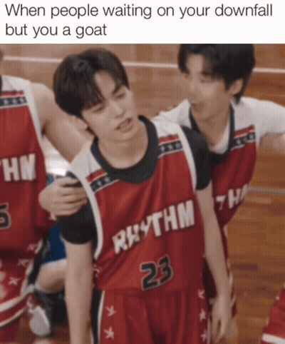 A Basketball Player Wearing A Red Jersey That Says Rhythm 23 GIF