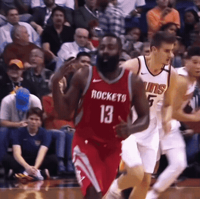 A Basketball Player Wearing A Red Jersey That Says Rockets 13 GIF