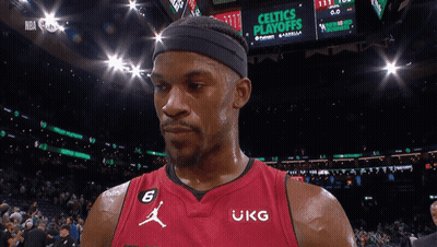 A Basketball Player Wearing A Red Jersey That Says Ukg On It GIF