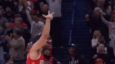 A Basketball Player Wearing A Red Jersey With The Number 15 On It GIF